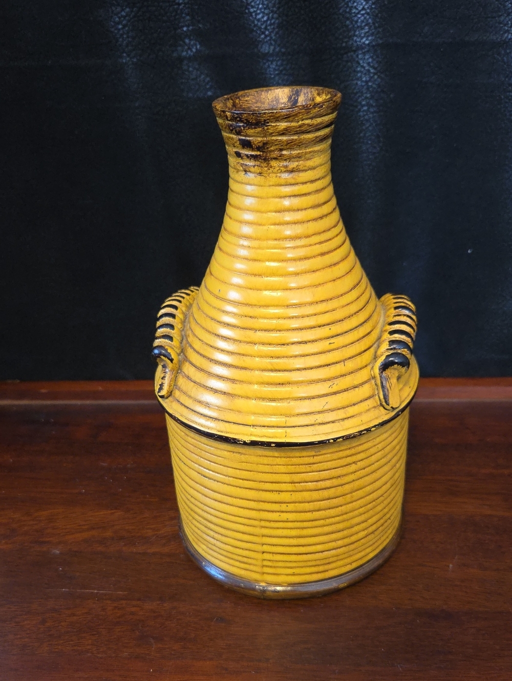 Kirklands Yellow Ribbed Resin Loop-Handled Vase - Picture 4 of 5